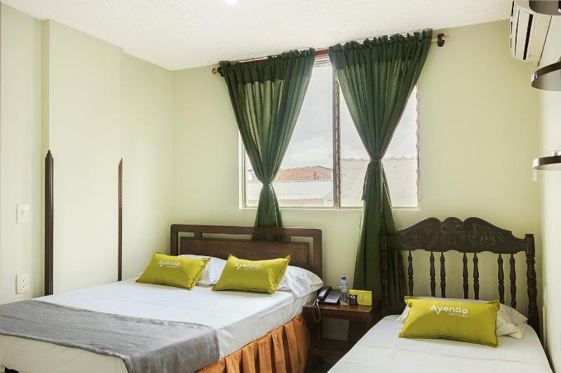 ホテル Ayenda 1506 La Puerta Del Sol ブカラマンガ 部屋 写真