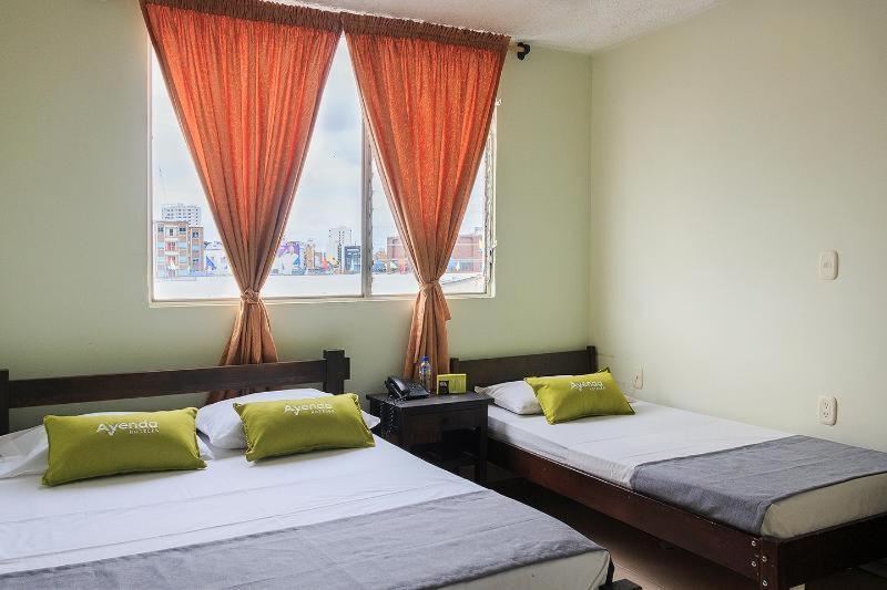 ホテル Ayenda 1506 La Puerta Del Sol ブカラマンガ 部屋 写真